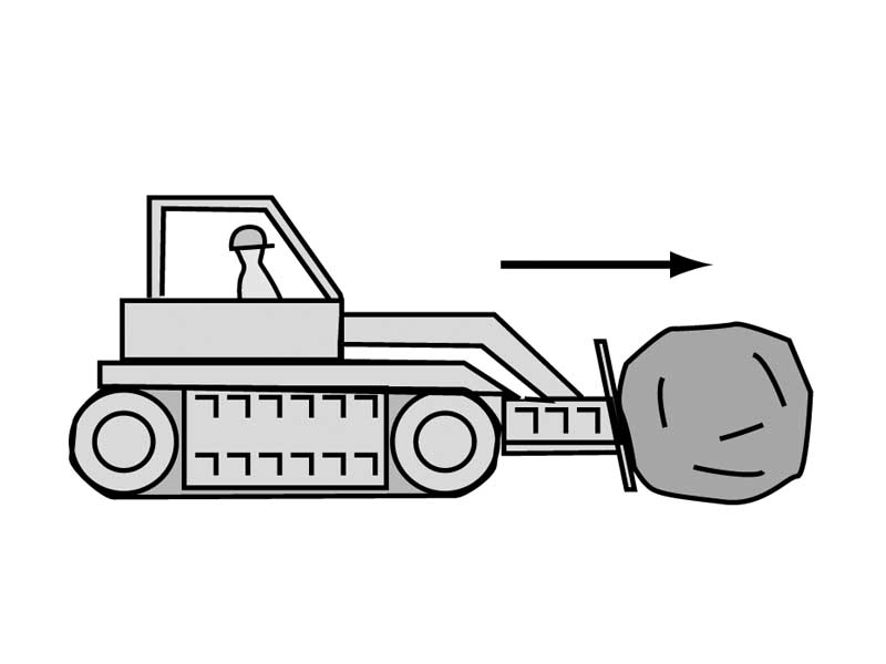 Bulldozer performing work on boulder