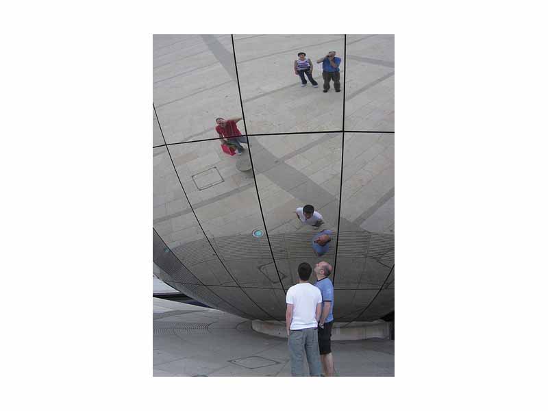 Reflections in a spherical convex mirror. The photographer is seen at top right